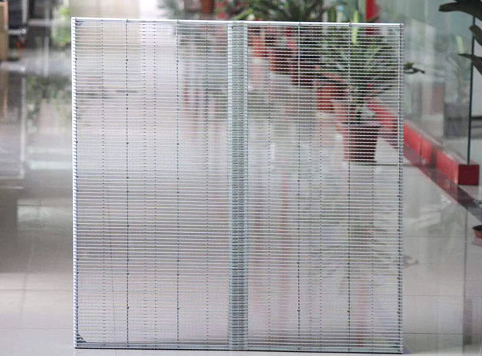 Comment un écran maillé LED permet-il d'obtenir à la fois la transparence et les détails de l'image ?